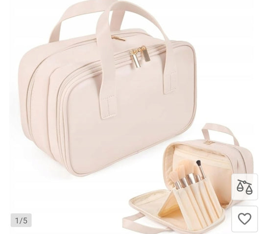Elegancka jasno różowa kosmetyczka w stylu torebki z rączkami